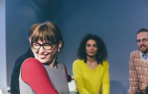 Group therapy session sitting in a circle Stock Photos