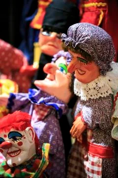 Group of thread marionettes in a theater Stock Photos