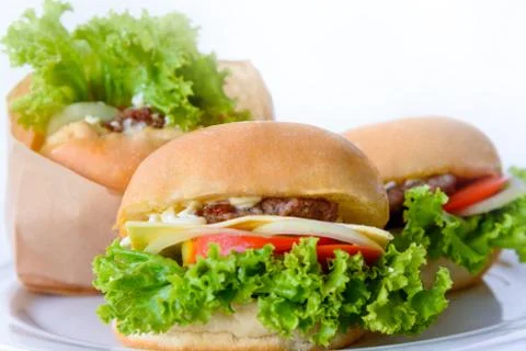 Group of three hamburger on a white background Stock Photos