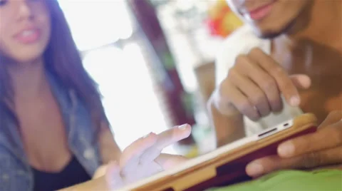 A group of three hipster fun using a tablet computer Stock Footage 54937754