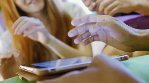 A group of three hipster fun using a tablet computer Stock Footage 54937788
