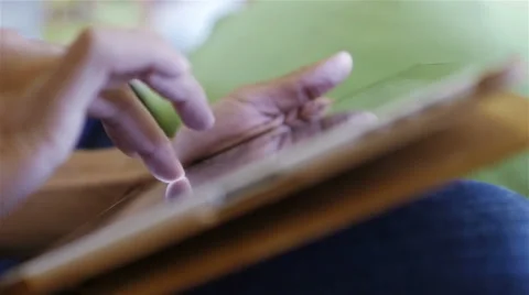 A group of three hipster fun using a tablet computer Stock Footage 54937996