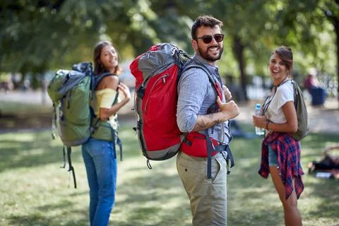 Group of three travellers sightseeing Stock Photos