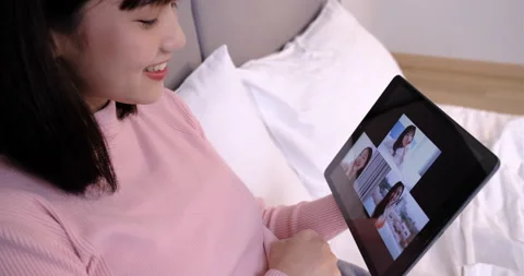 Group together of user interface remotely: woman video chatting with friend Stock-Footage 132341206