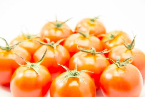 Group of tomatoes with green leaf Stock Photos