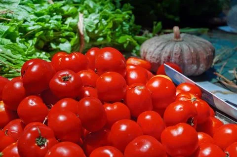 Group of tomatoes in rural kitchen Stock Photos
