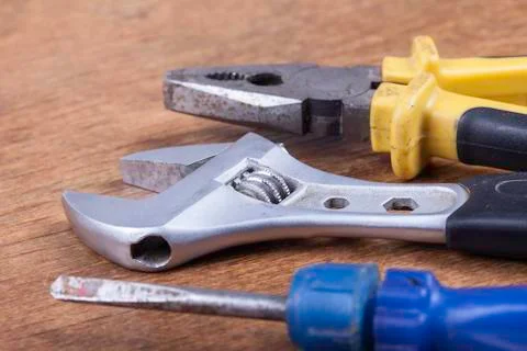 Group of tools on wooden background Stock Photos