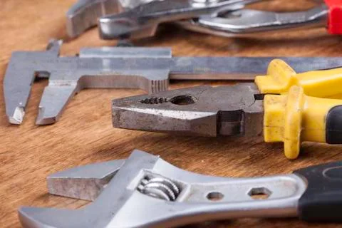 Group of tools on wooden background Stock Photos