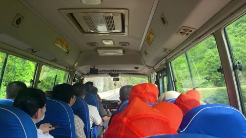 Group of tourist sitting in bus during mountain trip Stock Footage 338094228
