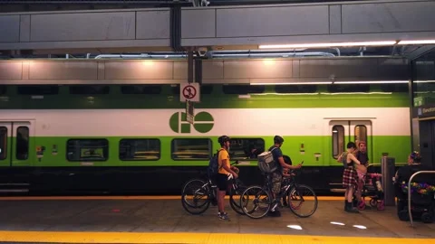 A group of tourists with bicycles stand on a platform of Union Station. Stock-Footage 314332140