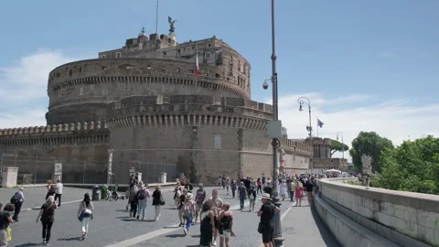Group of tourists on the bridge in front of the castle. Stock Footage 243972337