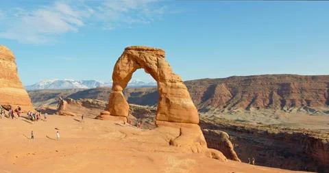 Group of tourists at Delicate Arch 4K Stock Footage 154274347