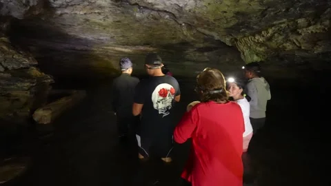 Group of tourists exploring the Amazon's Jumandy caves 動画素材 334934270