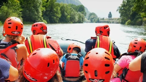 Group of tourists having fun doing water rafting point of view shot Stock Footage 112260080