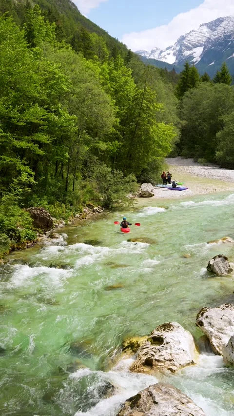 Group of Tourists Kayaking on Emerald Rapids of Soča River, Slovenia Stock Footage 340397553