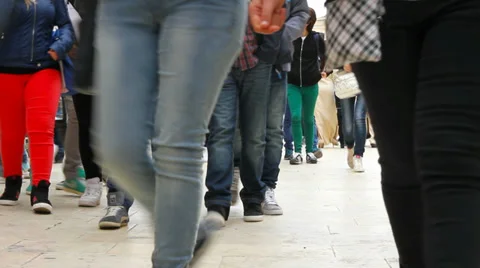 A group of tourists passing from one object to another. Stockbeeldmateriaal 37106308