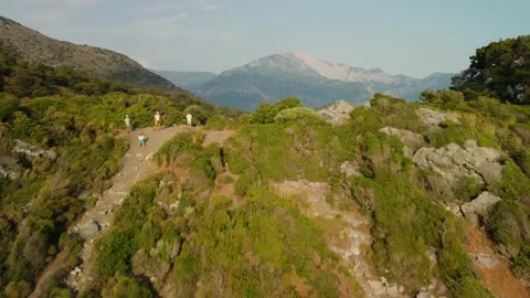 A group of tourists on the rocky slope looking at sea view at Darbogaz Bay. Stock Footage 196984953