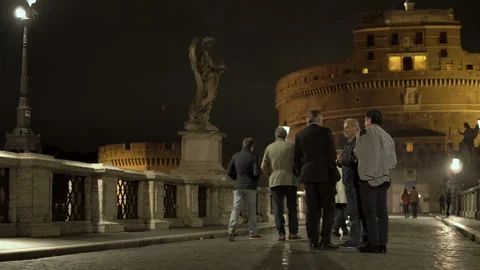 Group of tourists talking on the background of the Castel Sant'Angelo Stock Footage 99408145