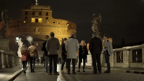 Group of tourists talking on the background of the Castel Sant'Angelo Stock Footage 99411413