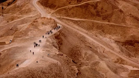 A group of tourists in the vicinity of the Dead Sea. Stock Footage 177459850