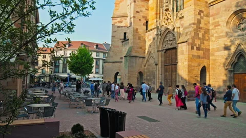 A Group of Tourists visiting Large Roman Catholic St Martin's Church in Colmar. Stock Footage 247250734