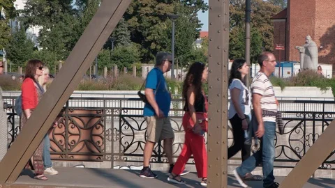 Group Of Tourists Walking on a Bridge in Old European City Stock Footage 114983254