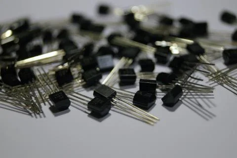 Group of transistors on a neutral background Stock Photos