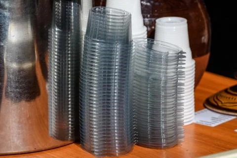 Group of transparent plastic boxes arranged on a table Stock Photos