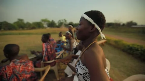 Group of tribes playing drum and dancing in field, Ghana Stock Footage 62388289