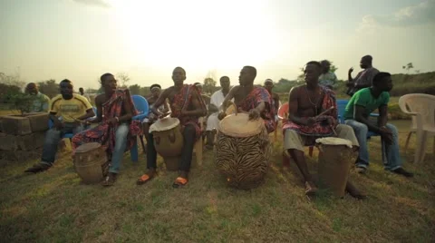 Group of tribes playing drum in field, Ghana Stock Footage 62388267