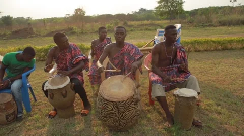 Group of tribes playing drum in field, Ghana Stock Footage 62388269