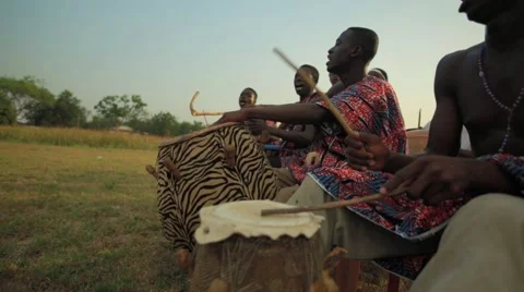 Group of tribes playing drum in field, Ghana Stock Footage 62388276