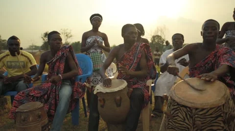 Group of tribes playing drum in field, Ghana Stock Footage 62388282