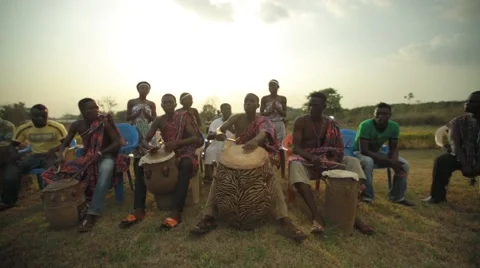 Group of tribes playing drum in field, Ghana Stock Footage 62388283