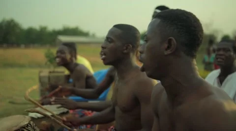 Group of tribes playing drum in field, Ghana Stock Footage 62388334