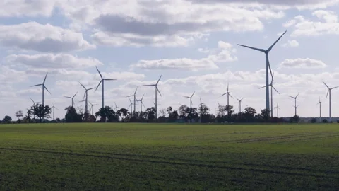 A group of turning wind turbines Stock Footage 219804802