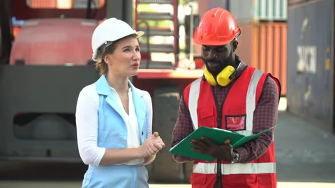 Group of two african american  engineer man and inspector Caucasian woman t.. Stock Footage 248361245