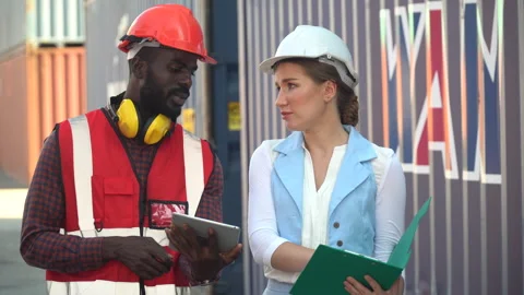 Group of two african american  engineer man and inspector Caucasian woman t.. Stock Footage 248361382