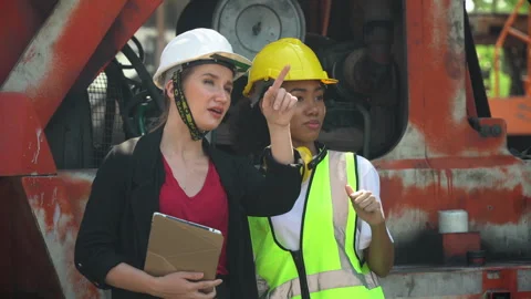 Group of two diversity woman container worker working together with tablet .. Stock Footage 248348053