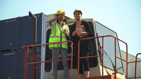 Group of two diversity woman container worker working together with tablet .. Stock Footage 248348797