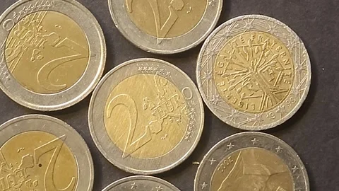 Group of two Euro coins rotate Stock Footage 245833936