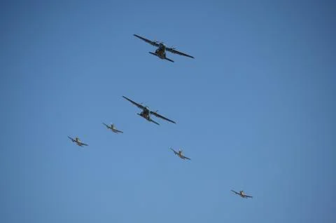 Group of Two Fixed Wing Aircrafts and Four Gray Fighter Aircrafts Stock Photos
