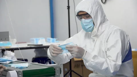 Group of two inspector worker wearing ppe suite, face protective mask and glo Stock Footage 146819999