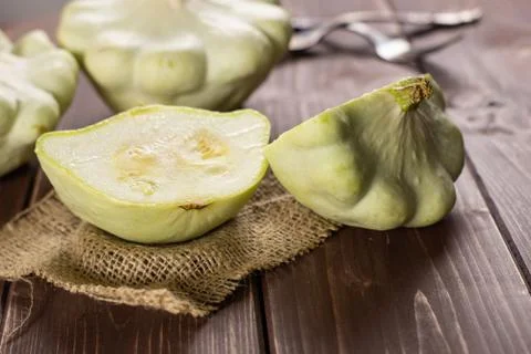 Group of two whole two halves of summer white pattypan squash composition on  Stock Photos