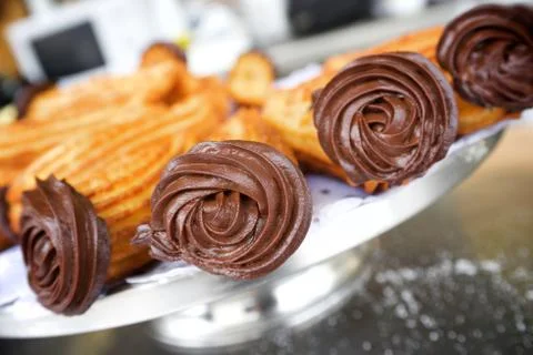 Group of typical churros at a stall, Spain Фото