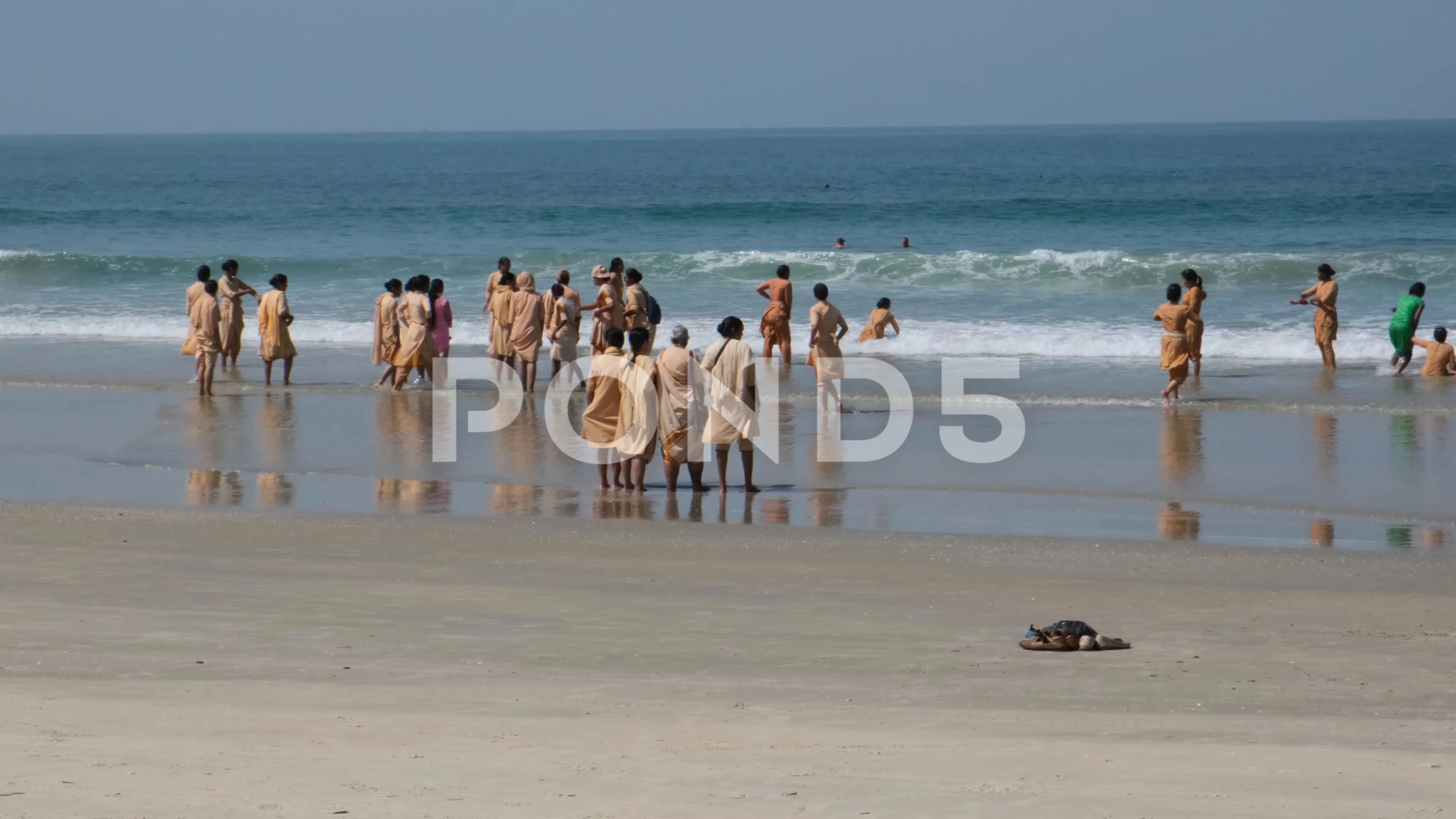 Indian Topless Beach Videos - Group of unidentified Indian pilgrims wo... | Stock Video | Pond5