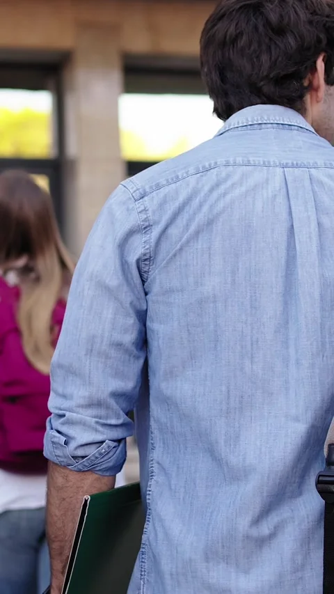 Group of unrecognizable students seen with their backs turned Stock Footage 269243213