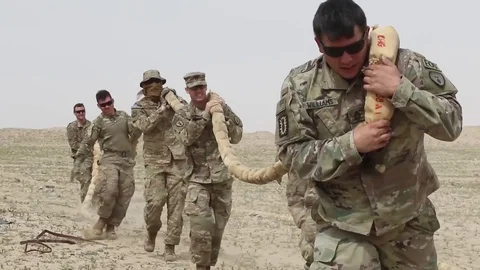 A group of US marines set up a Code H demolition out in the desert, 2010s Stock Footage 112531977