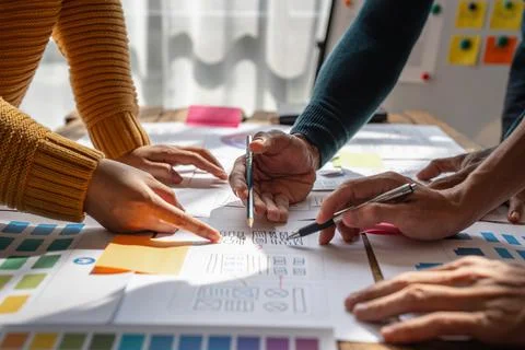 Group of ux developer and ui designer brainstorming about app interface design Stock Photos