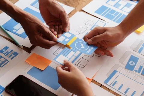 Group of ux developer and ui designer brainstorming about app interface design Foto stock